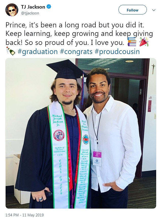 Proud: The new grad posed with his cousin TJ on the joyous day